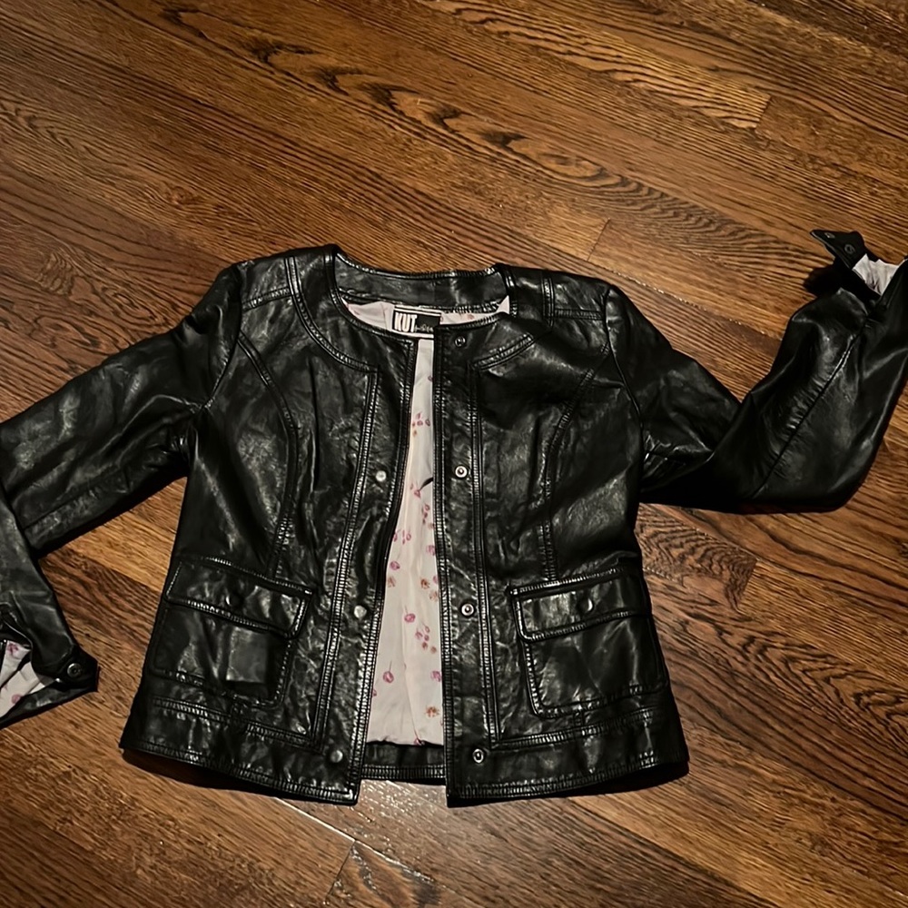 Woman black faux leather shirt jacket
